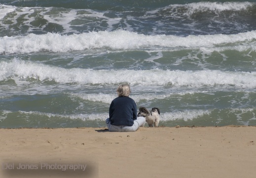 A lady in the beach with her dog, L'Escala