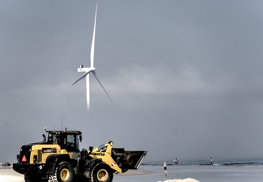 A digger on the beach