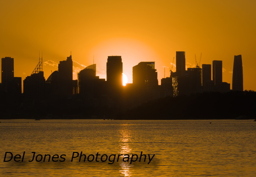 Sun behind Sydney