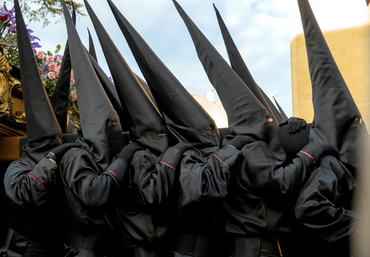 Black penitents on the march