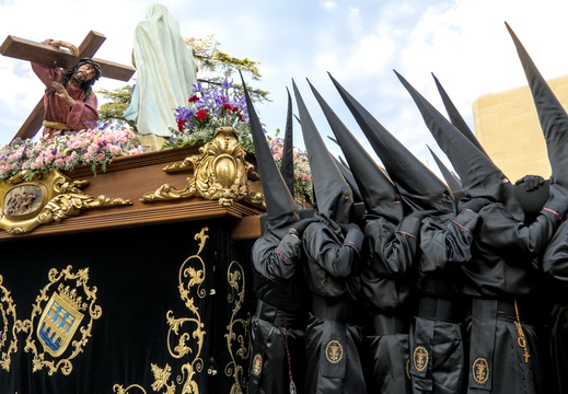 Black penitents on the march